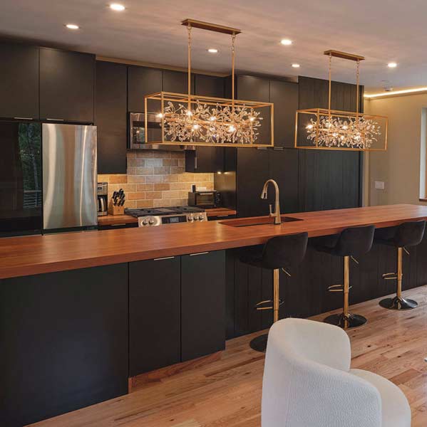 Custom new construction kitchen, cabinets, wall cladding and Sapele Island from LandmarkAcadia Group & Spiritcraft Furniture