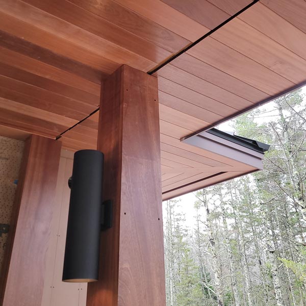 Solid Wood Columns and Soffit Cladding in Sapele Mahogany for New Construction Covered porch