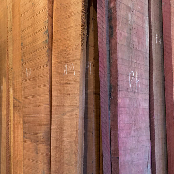 Quality rough sawn hardwood boards of Purpleheart, African Mahogany, Walnut and more