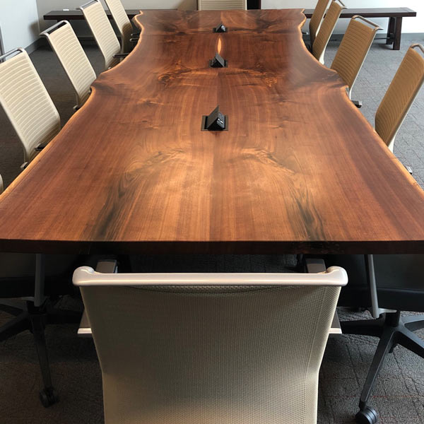 finished live edge conference table from large book matched set of kiln dried walnut slabs