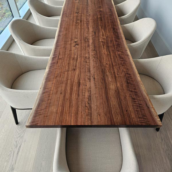 custom made walnut live edge table installed in grand rapids, mi for chicago designer