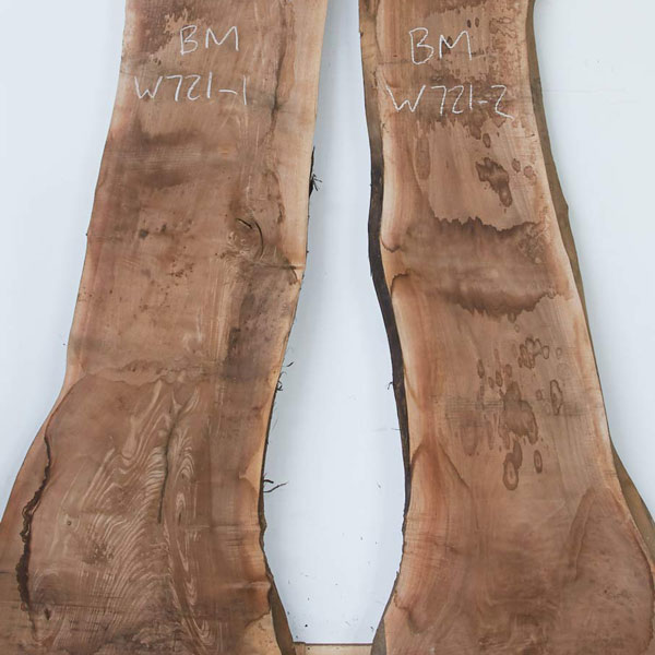 curved book matched walnut slabs - professionally kiln dried for quality tables