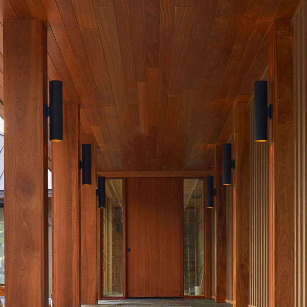 Pivot door and custom Sapele Mahogany columns and half columns in Bar Harbor, Maine made by by Spiritcraft Furniture