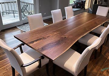 12 foot long Walnut Live Edge Dining Table with 4 foot long separate table extension in place