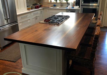 Custom Walnut wide plank kitchen island top for Chicago area home.