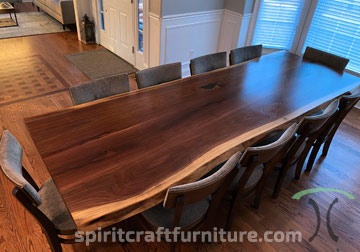 Solid hardwood live edge dining table from slabs of kiln dried Black Walnut and RH Yoder chairs at Spiritcraft Furniture in East Dundee, Illinois