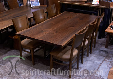 Black Walnut live edge dining table with rh yoder somerset dining chairs for Chicago client.
