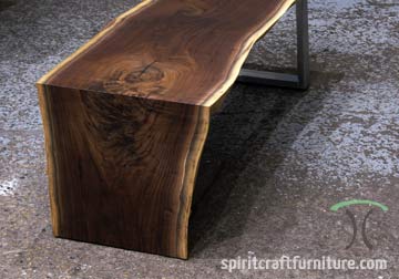 Black Walnut live edge coffee table with waterfall and stainless legs for Chicago area interior designer.